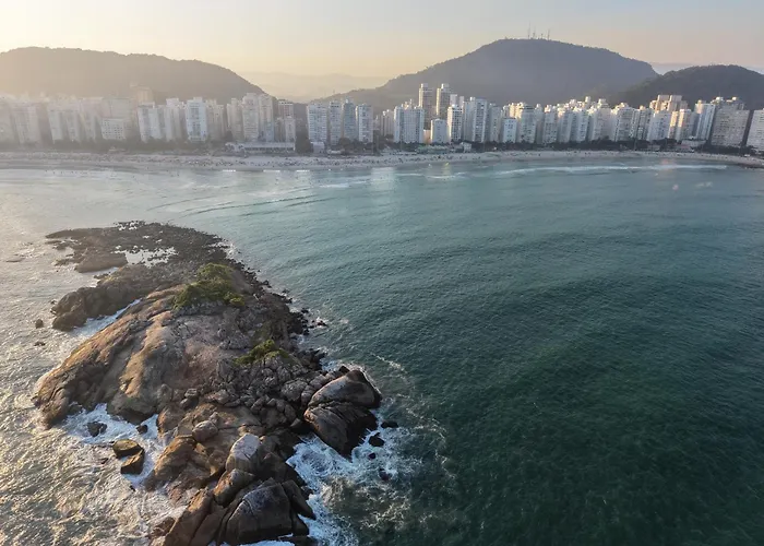 Suítes Pitangueiras - POUSADA FRENTE MAR Guarujá